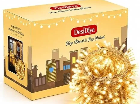 DesiDiya LED string lights, DesiDiya decorative lights, 35 feet LED string lights, warm white LED lights, copper wire string lights, LED pixel string lights, Diwali decoration lights, Diwali LED lights for home, Christmas string lights, Christmas decoration lights, festive lighting for home, decorative LED lights, LED fairy lights, warm white fairy lights, home decoration lights, indoor decorative string lights, bedroom fairy lights, balcony decoration lights, window decoration lights, wall decoration lights, wedding decoration lights, birthday party lights, party decoration string lights, festive home decor, Diwali home decoration ideas, Christmas home decoration ideas, warm white festive lights, golden glow string lights, LED lights for bedroom, LED lights for living room, decorative lights for balcony, LED lights for windows, copper LED string lights, pixel LED lights, serial string lights, long LED string lights, 35 feet decorative lights, festive LED lighting, celebration decoration lights, wedding backdrop lights, party backdrop lighting, cosy bedroom lighting, ambient lighting for home, decorative lighting ideas, home lighting accessories, festival decoration accessories, traditional home decoration, modern home decor lights, Indian festival lights, Diwali lighting ideas, Christmas tree lights, warm lighting for home, LED lights for celebrations, decorative lights for walls, string lights for parties, indoor festival lights, home ambience lights, aesthetic room decoration lights, festive room decor, LED decorative string lamps, holiday decoration lights, sparkling LED lights, warm white decorative lighting, home party decoration, affordable decorative lights, creative lighting ideas, seasonal decoration lights, DesiDiya warm white lights, festive LED string decoration, decorative lights for special occasions.